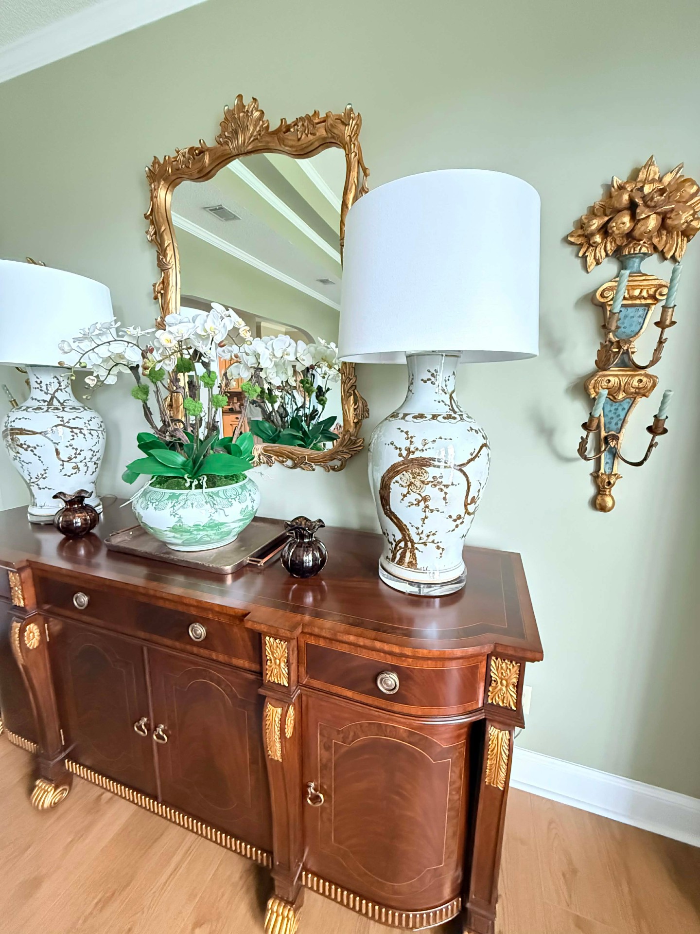 Gristmill Estates dining room buffet with antique gilded mirror